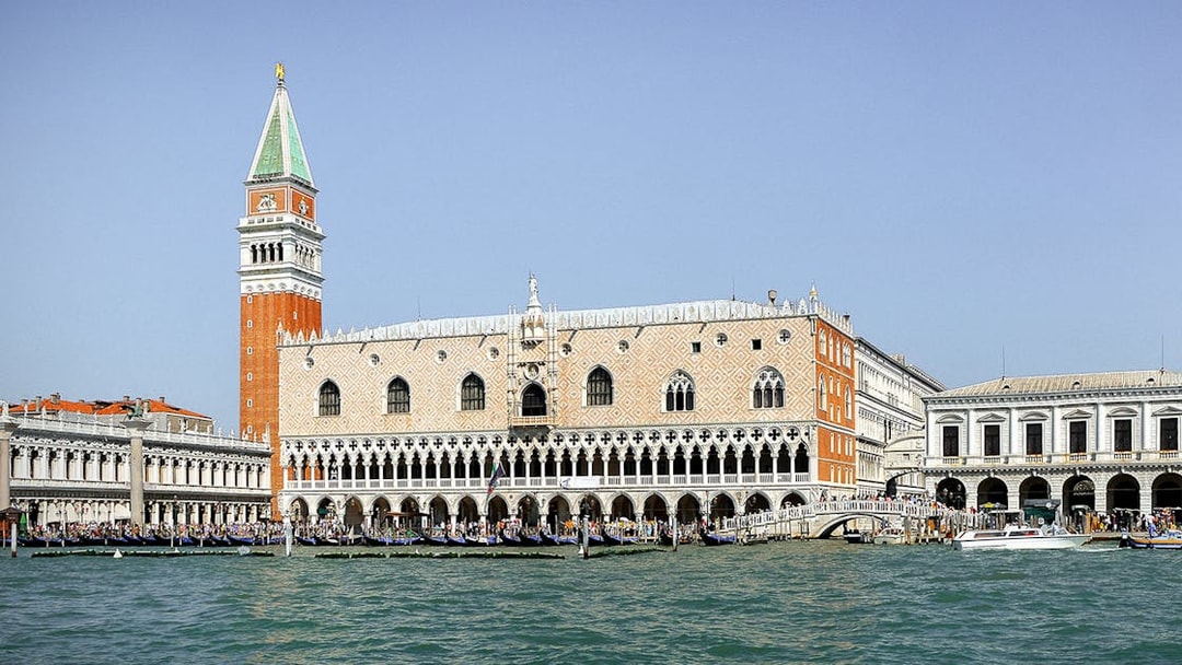 Doge's Palace and St. Mark's Campanile viewed from the Grand Canal in Venice.