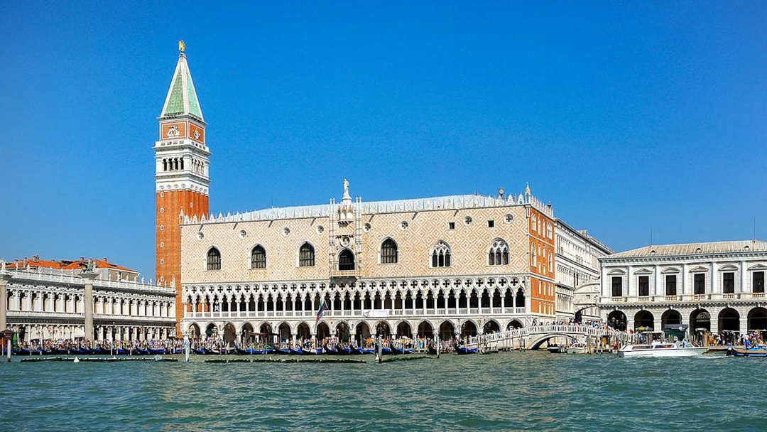 Doge's Palace and St. Mark's Campanile viewed from the Grand Canal in Venice.