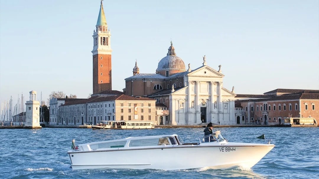 Water taxi cruising near San Giorgio Maggiore in Venice, Italy.