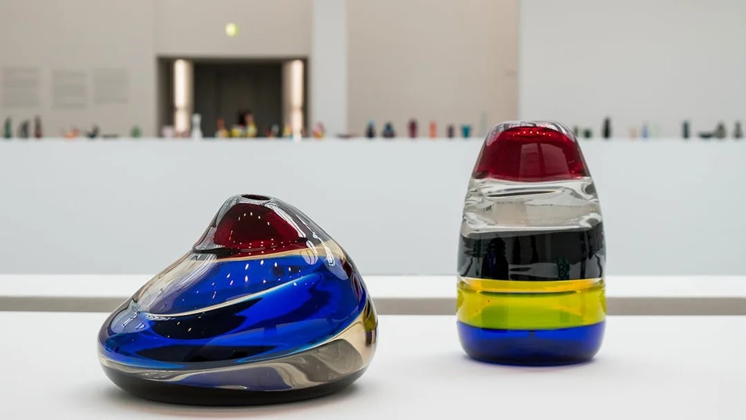 Colorful glass sculptures in a Venice museum exhibit.