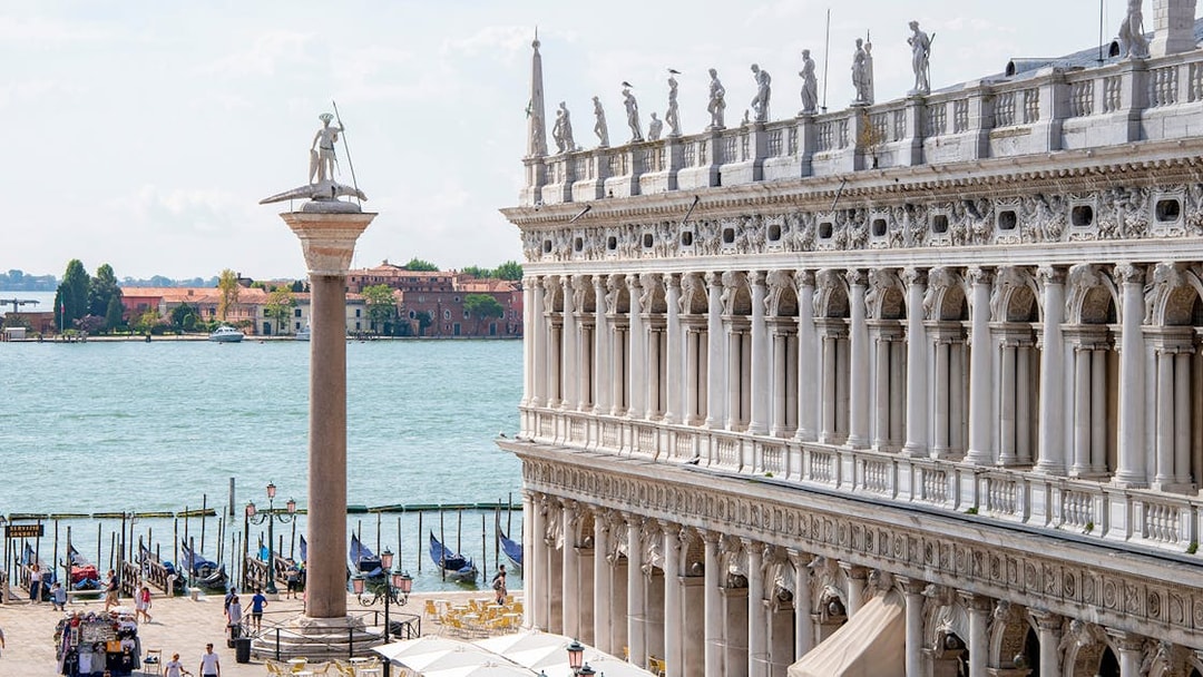 Venice Doge's Palace and San Marco column near the Grand Canal.
