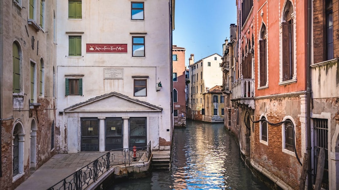 Venice canal view with historic buildings on a 2-hour walking tour.