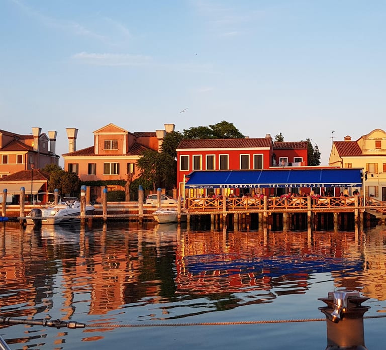 Venice by sailboat between Murano, the Lido, and the mysterious islands