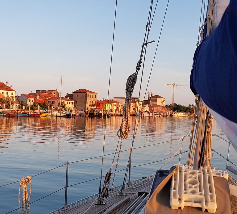 Venice by sailboat between Murano, the Lido, and the mysterious islands