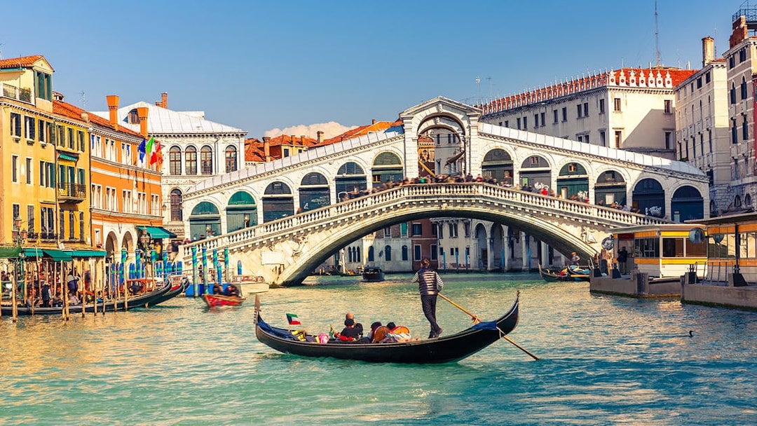 Gondola on Grand Canal near Rialto Bridge, Venice Self Guided Audio Tour.