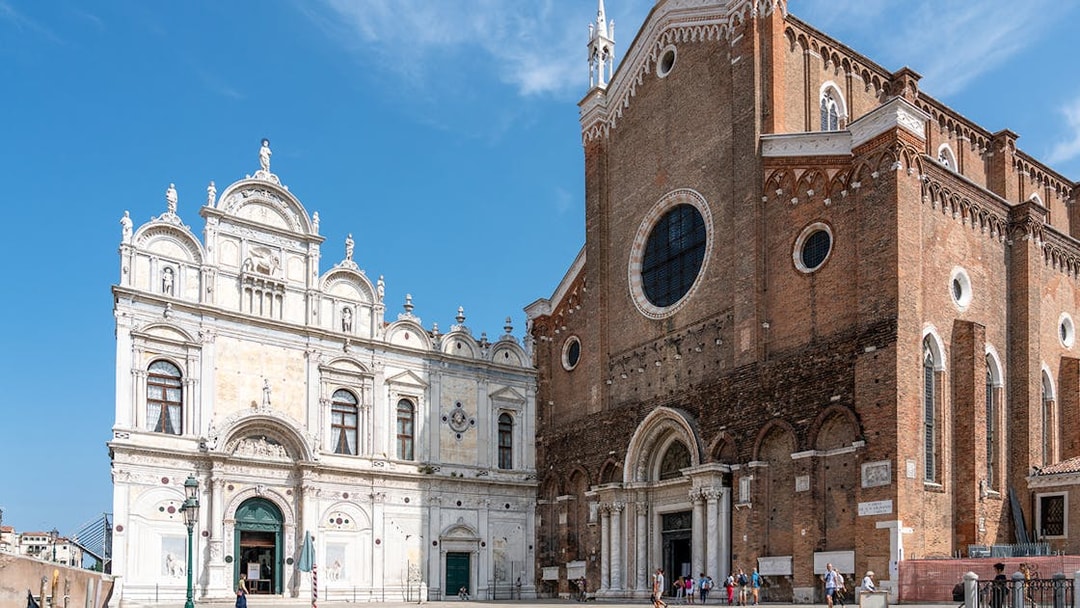 Facade of Santi Giovanni e Paolo Basilica in Venice during a walking tour.