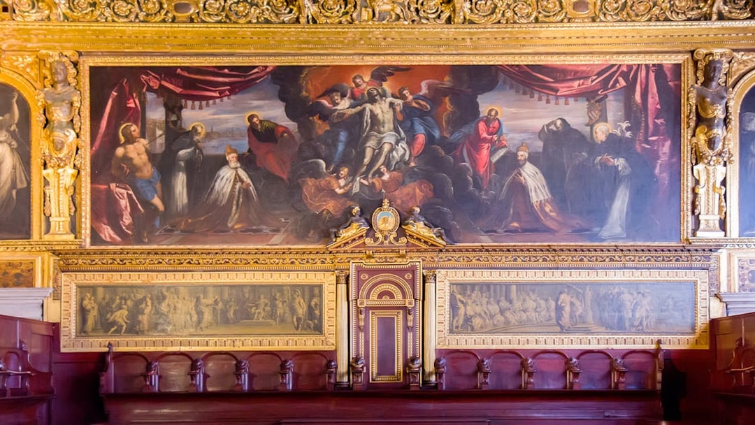 Interior artwork and ornate details of the Doge's Palace in Venice, Italy.