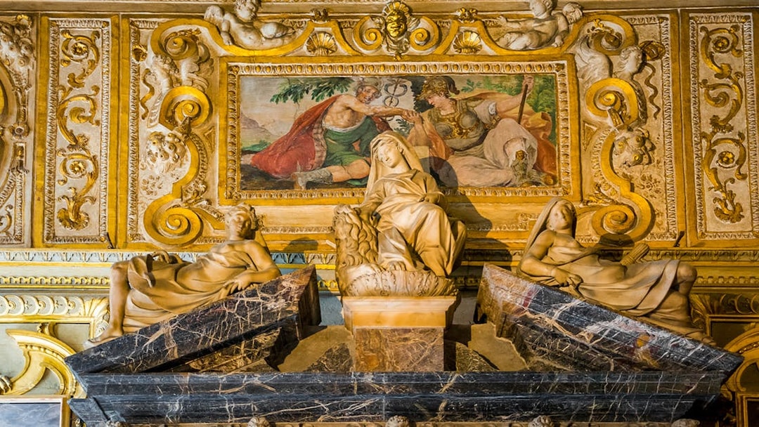 Sculptures and fresco in the Doge's Palace, Venice, depicting classical figures and ornate details.