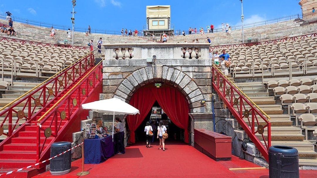 Verona Arena entrance with tourists on a skip-the-line guided tour.
