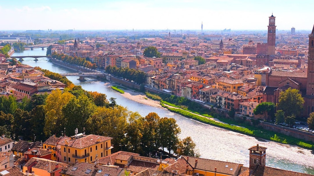 Aerial view of Verona with the Adige River and historic buildings, Italy.