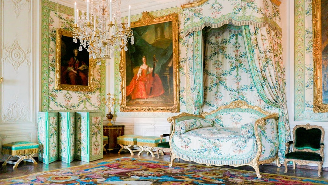 Madame Victoires Room at the Palace of Versailles with ornate decor and paintings.