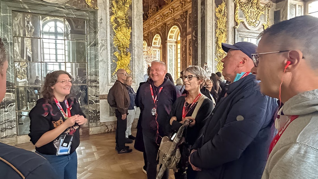Tour group in the King's Private Apartments at Palace of Versailles, France.