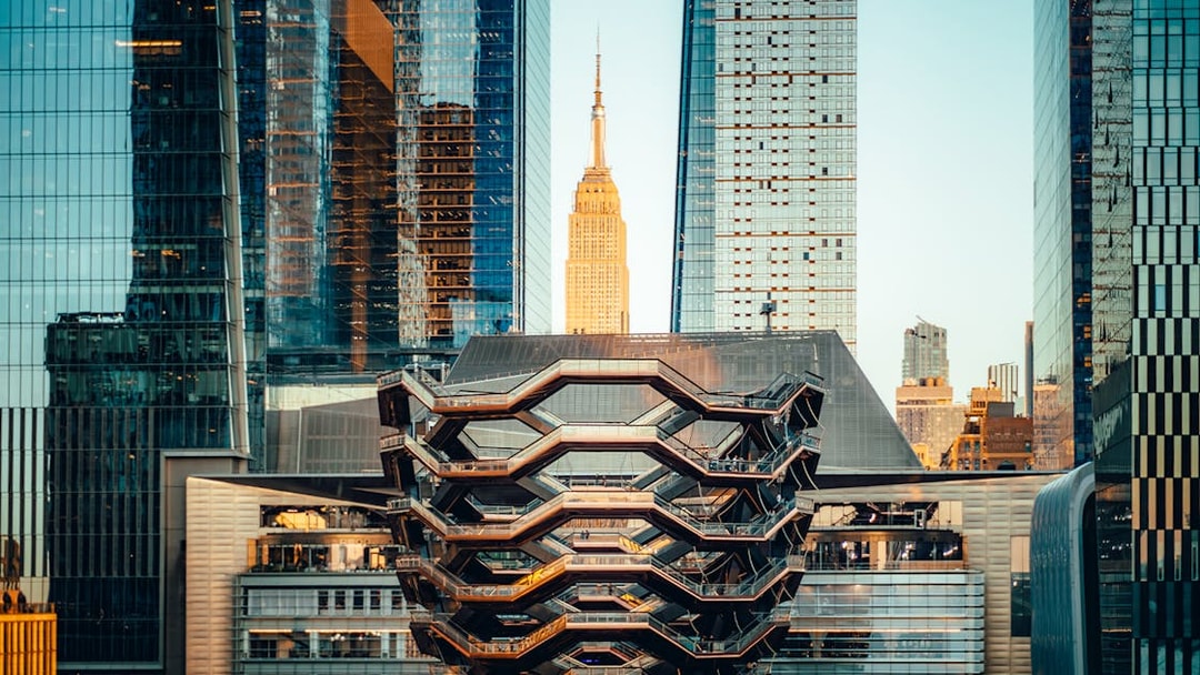 Vessel structure in New York City with skyscrapers in the background.
