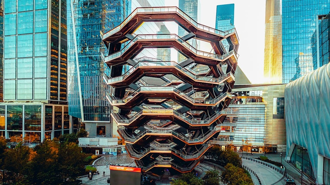 Vessel structure in New York City surrounded by skyscrapers.