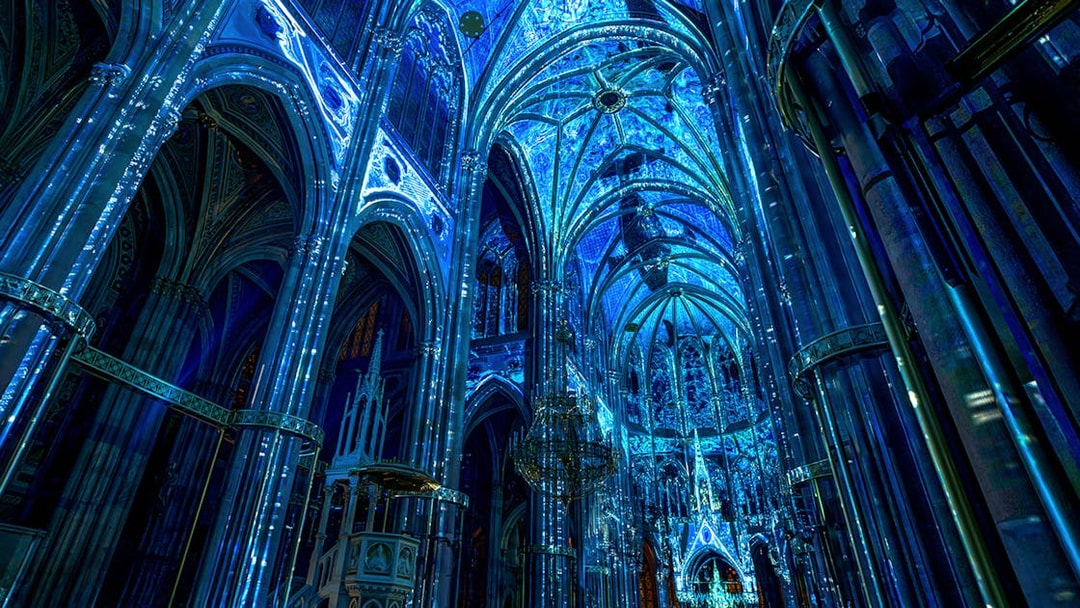 Votivkirche interior illuminated in blue light, Vienna.
