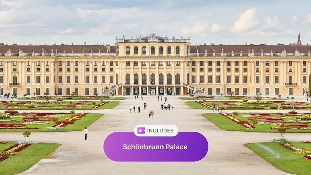 Schonbrunn Palace in Vienna with gardens and visitors.