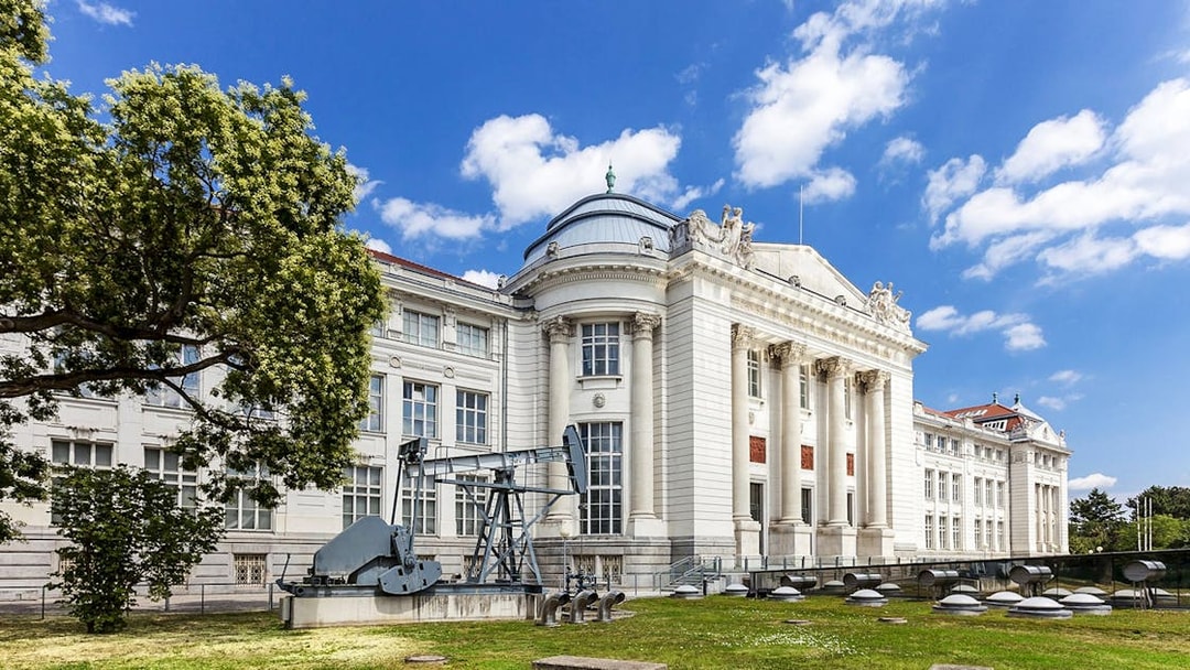 Vienna Museum of Science and Technology exterior with machinery display.