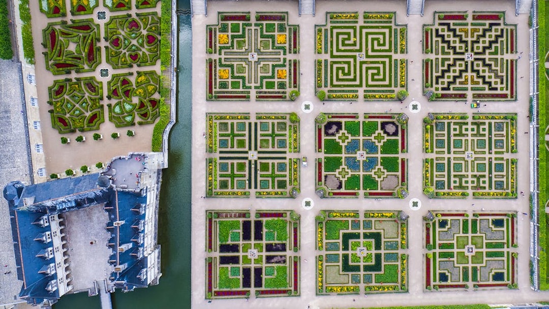 Aerial view of Château of Villandry Gardens' intricate geometric patterns in France.