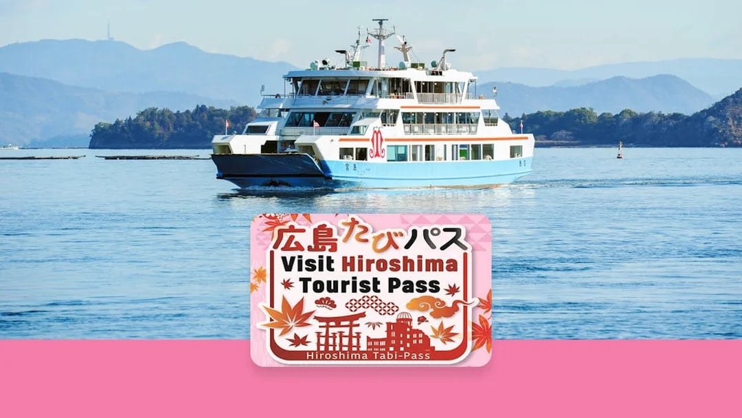 Ferry on Hiroshima Bay with Hiroshima Tourist Pass sign in foreground.