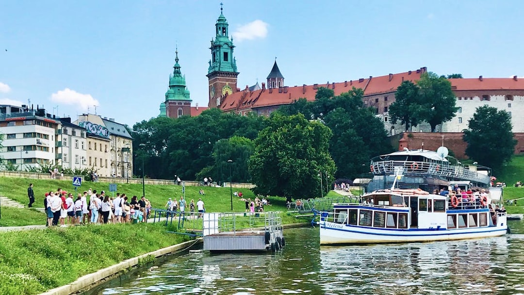 Boat tour on the Vistula River with Wawel Castle in the background, Cracow City Tour.