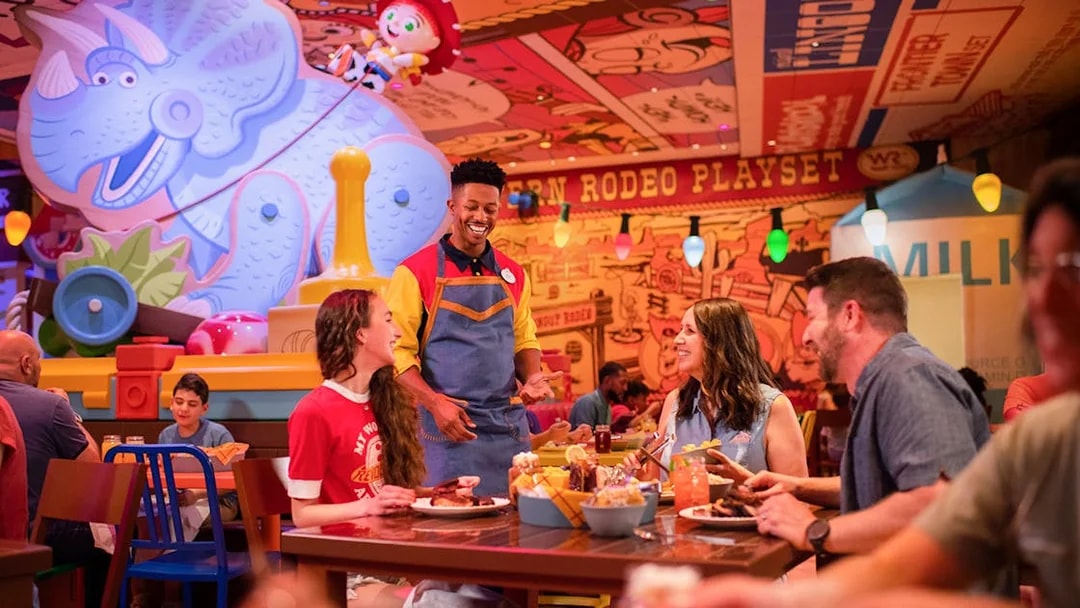 Guests dining at Toy Story-themed restaurant in Walt Disney World Resort, Orlando.