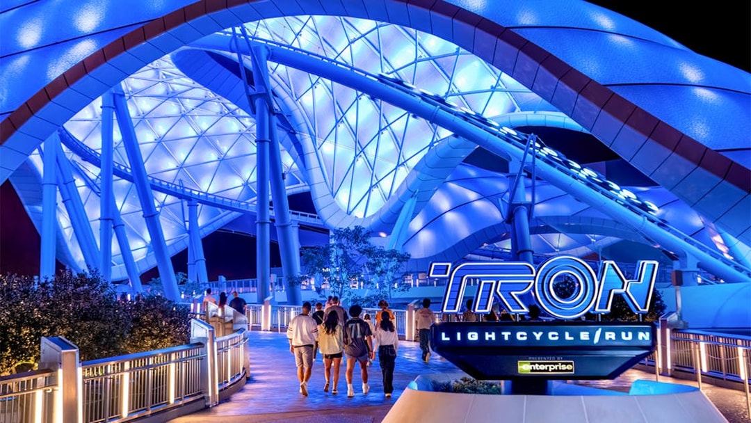 Visitors walking towards Tron Lightcycle ride at Magic Kingdom, Walt Disney Resort, Orlando.