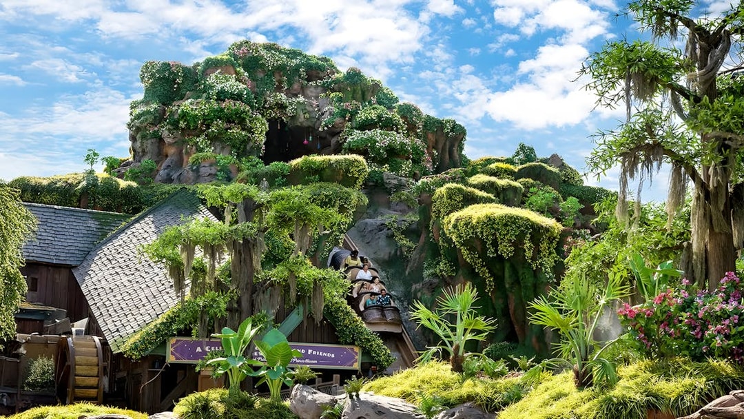 Tiana's Bayou Adventure ride with lush greenery at Walt Disney World Resort, Orlando.