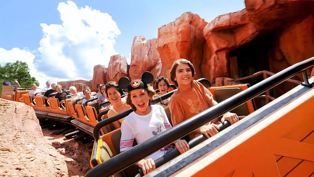 Guests enjoying a rollercoaster at Animal Kingdom Theme Park, Walt Disney World, Orlando.