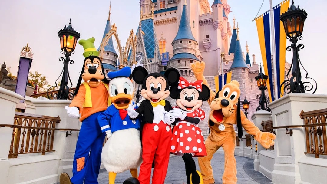 Mickey and friends in front of Cinderella Castle at Magic Kingdom, Walt Disney Resort, Orlando.