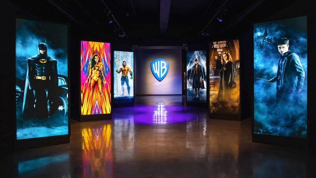 Exhibit at Warner Bros Studio Tour Hollywood with illuminated character portraits.