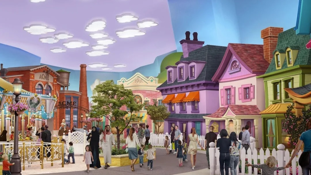 Visitors exploring cartoon-themed street at Warner Bros World Abu Dhabi.