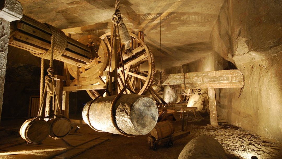 Wieliczka Salt Mine vintage machinery with wooden gears and ropes.
