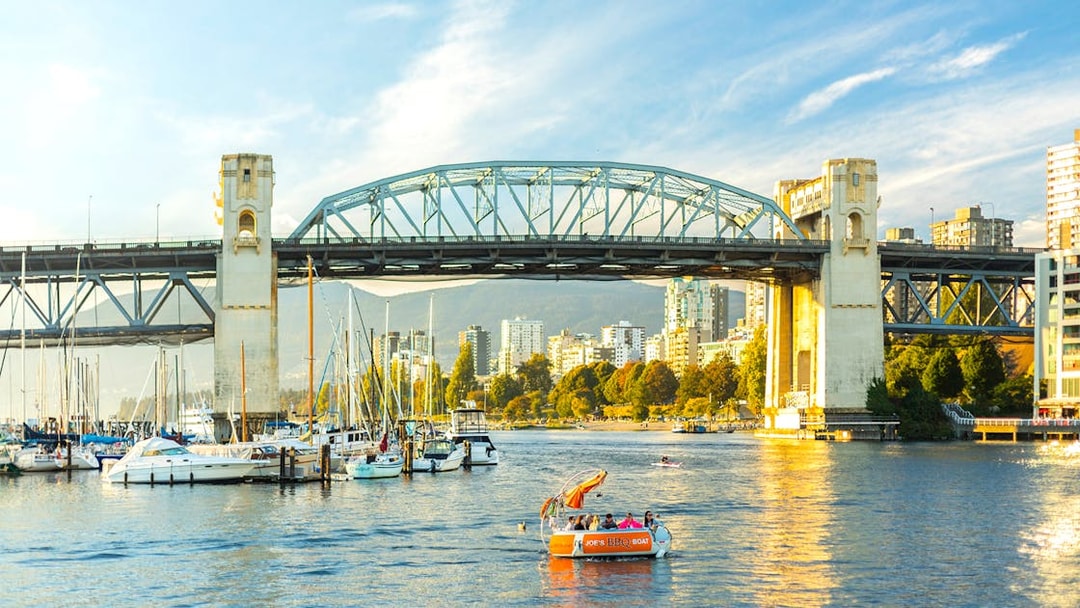 Granville Street Bridge over False Creek with boats in Vancouver, Canada.
