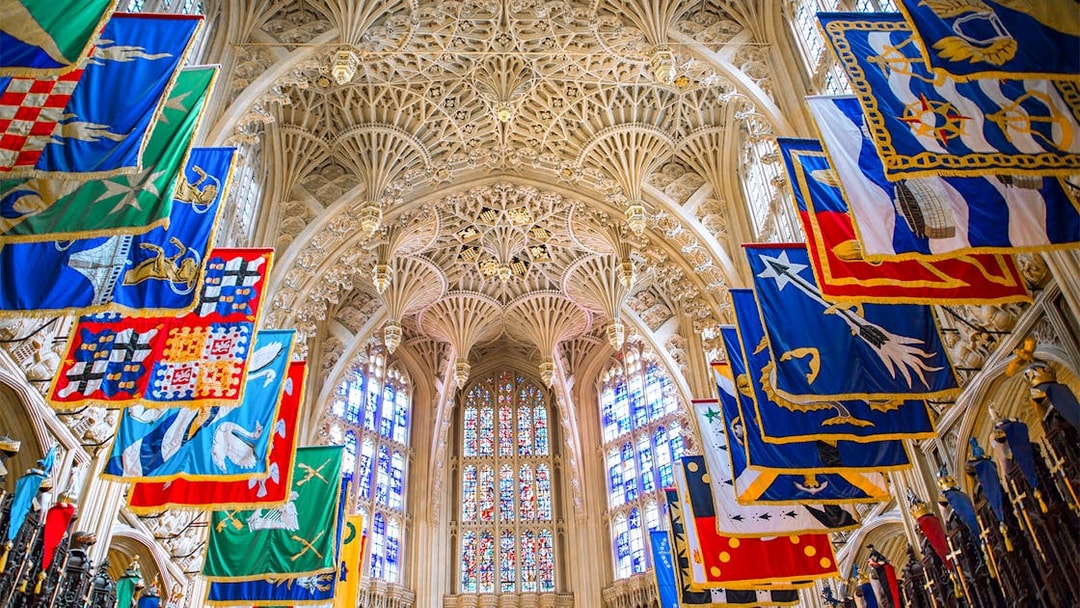 Lady Chapel ceiling and colorful banners at Westminster Abbey, London.