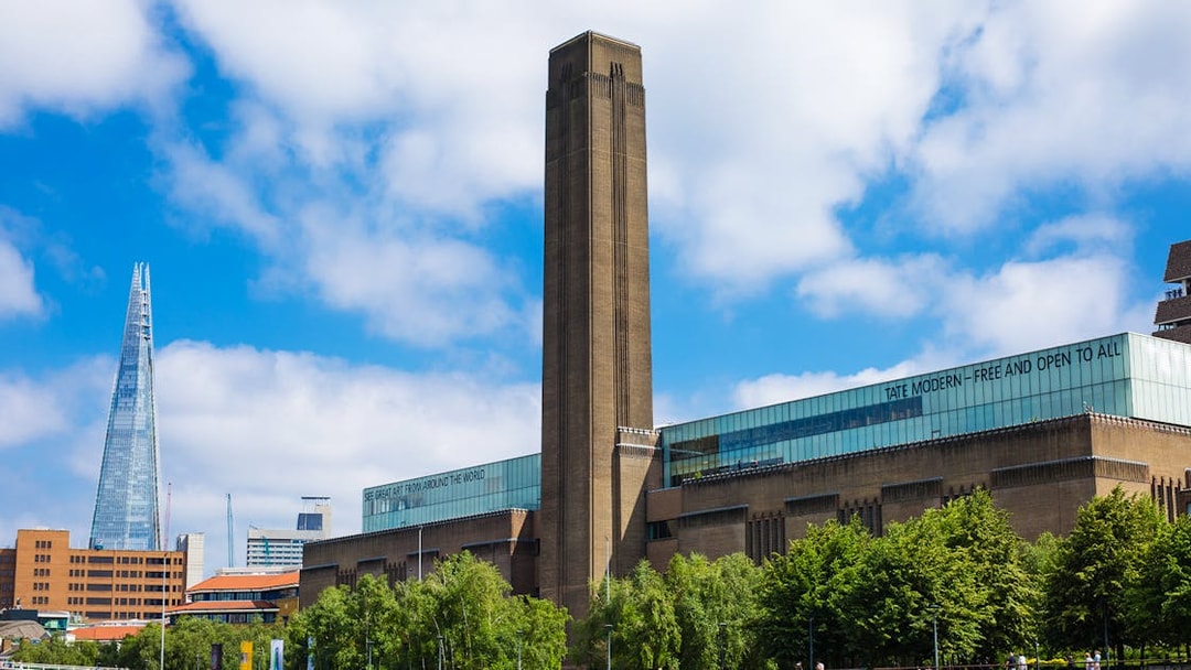 Tate Modern and Shard viewed from Thames Sightseeing Cruise in London.