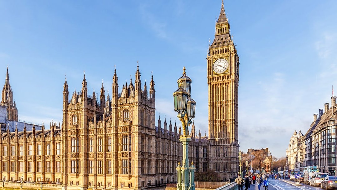 Big Ben and Houses of Parliament viewed from Westminster Bridge, London.