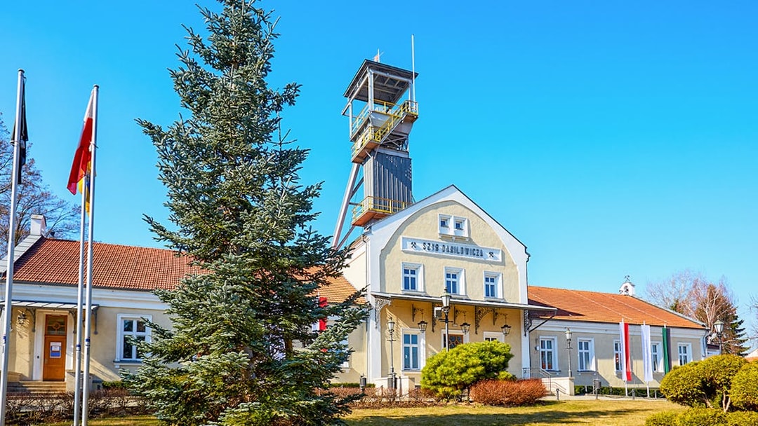 Entrance of the Wieliczka Salt Mine historic building with tower, Poland.