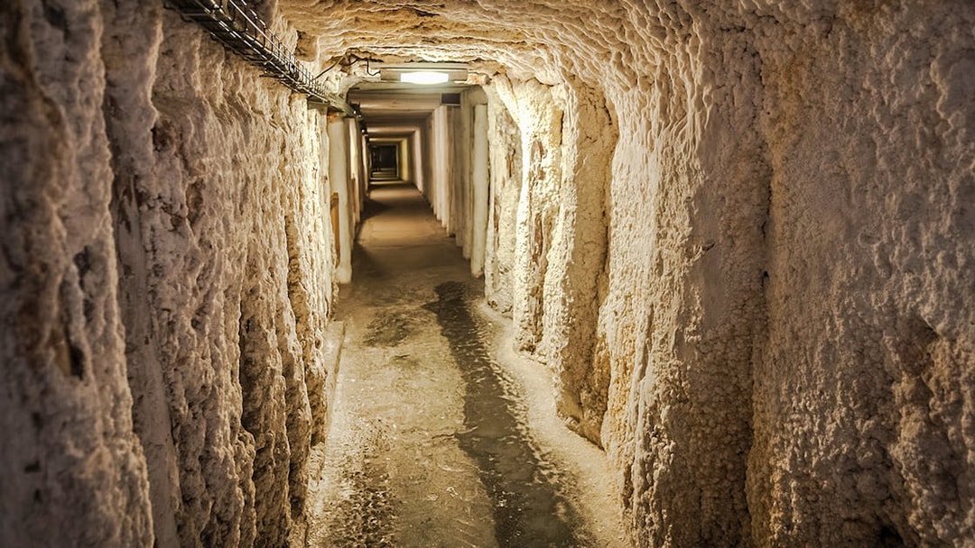 Wieliczka Salt Mine underground passageway with textured salt walls.