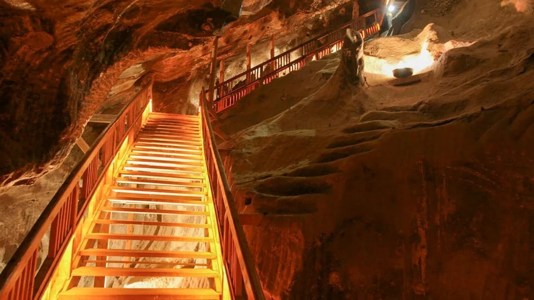 Staircase inside Wieliczka Salt Mine during guided tour with hotel transfers.