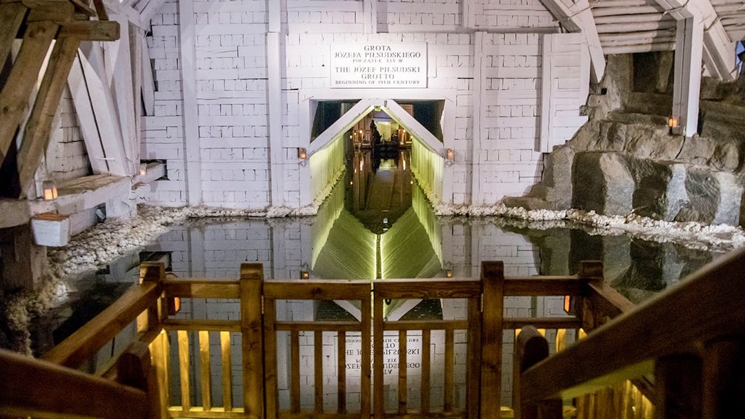 Wieliczka Salt Mine's Józef Piłsudski Grotto with reflective water, Krakow tour.