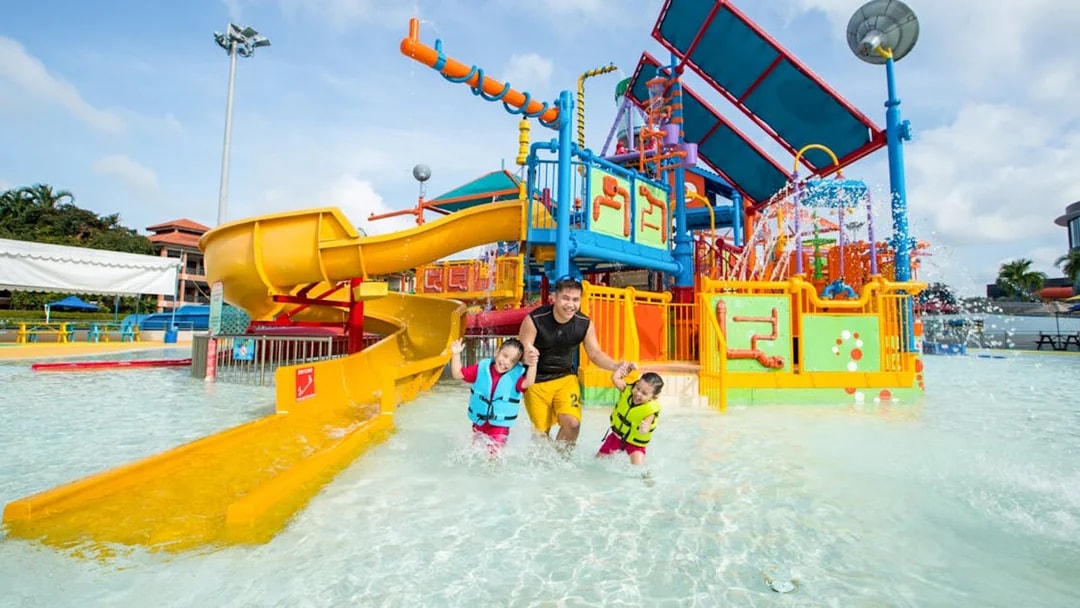 Family enjoying water play area at Singapore's Wild Wild Wet.