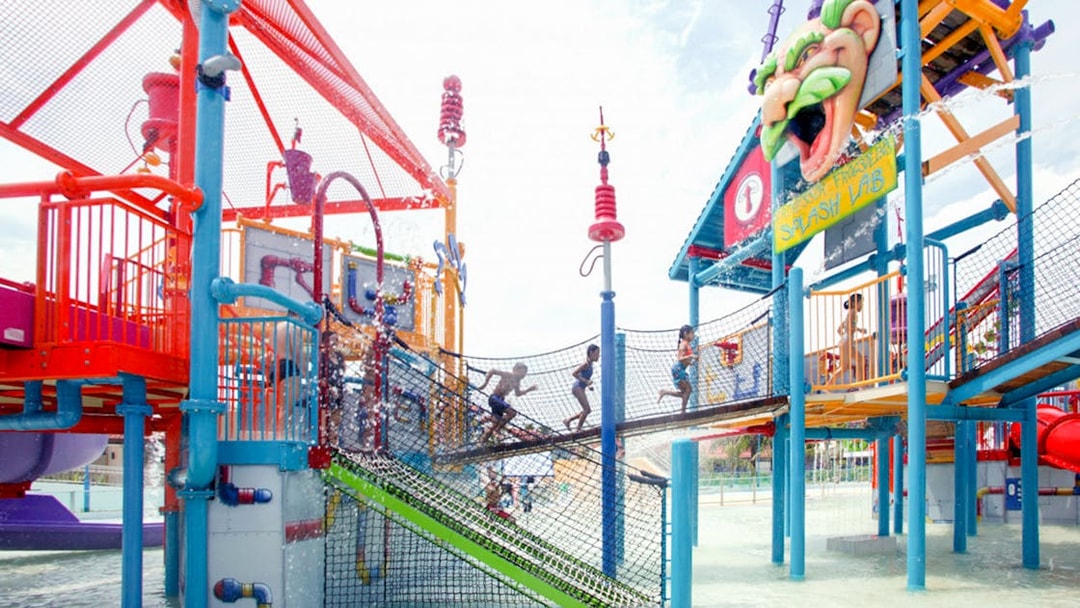 Children playing at Splash Lab in Wild Wild Wet water park, Singapore.