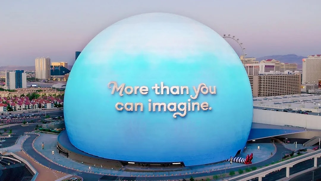 Sphere in Las Vegas with "More than you can imagine" text, Wizard of Oz theme.