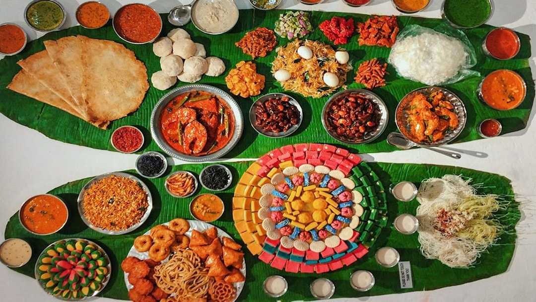 Traditional Malaysian dishes displayed on banana leaves at Wonderfood Museum.