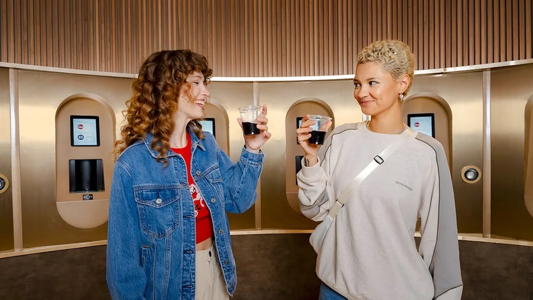 Friends enjoying drinks at World of Coca-Cola Museum, Atlanta.