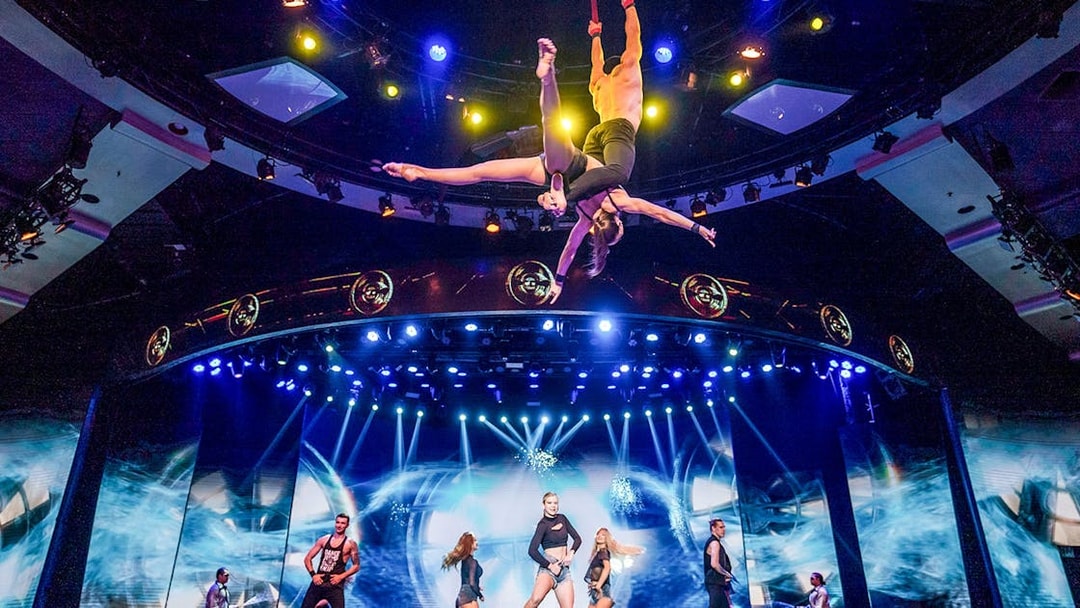 Acrobats performing aerial stunts at WOW: The Vegas Spectacular show.