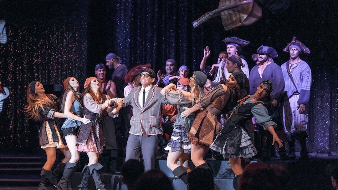 Performers in pirate costumes on stage during WOW: The Vegas Spectacular show.