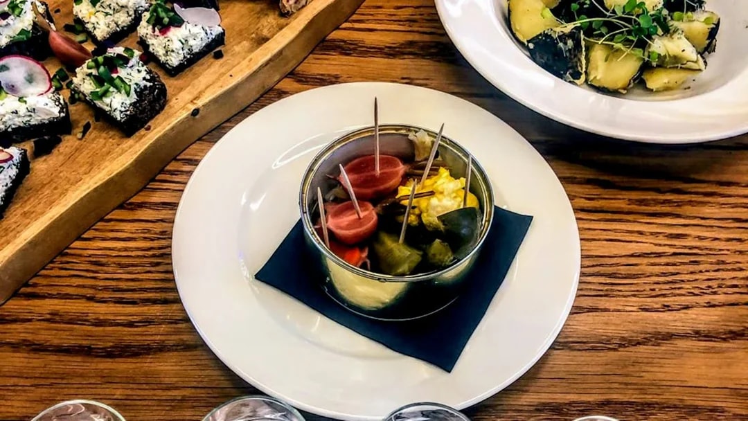 Vodka tasting snacks with pickles and appetizers in Wroclaw.