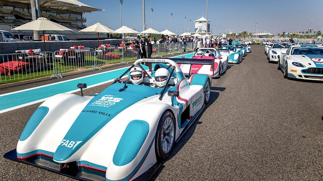 Race cars lined up for the YAS Radical SST Passenger experience at Yas Marina Circuit.