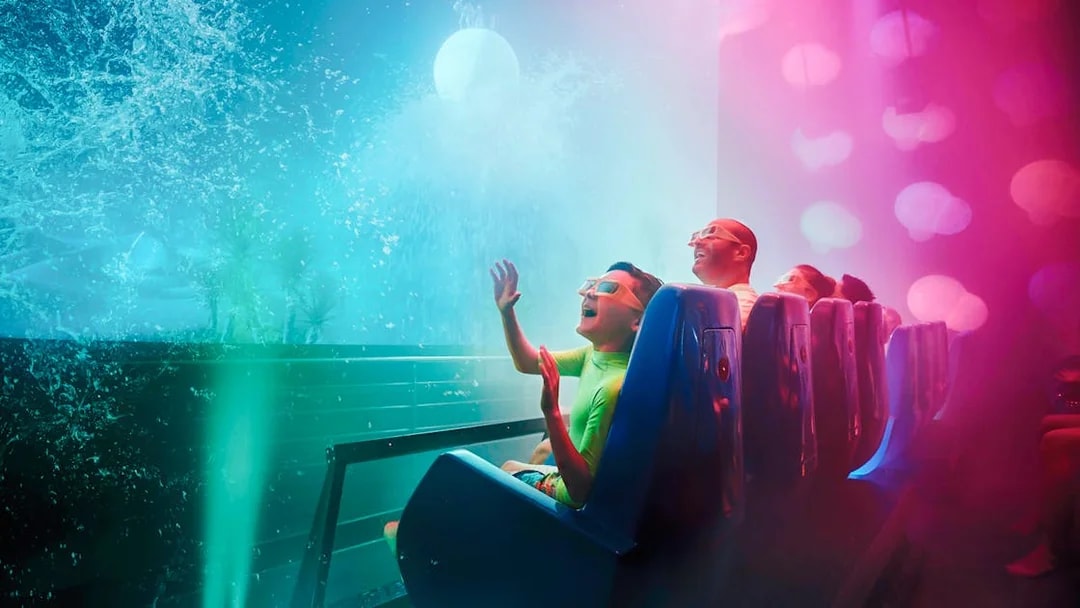 Family enjoying Cinesplash ride at YAS Waterworld, Abu Dhabi.